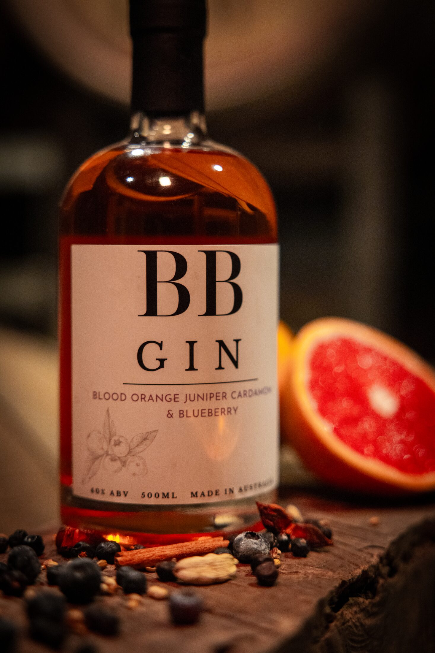 BB Blood Orange Gin bottle with a halved blood orange